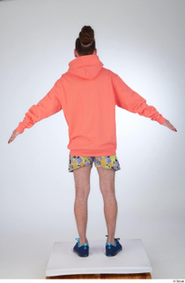 Nigel a-pose blue sneakers dressed floral printed shorts salmon hoodie…